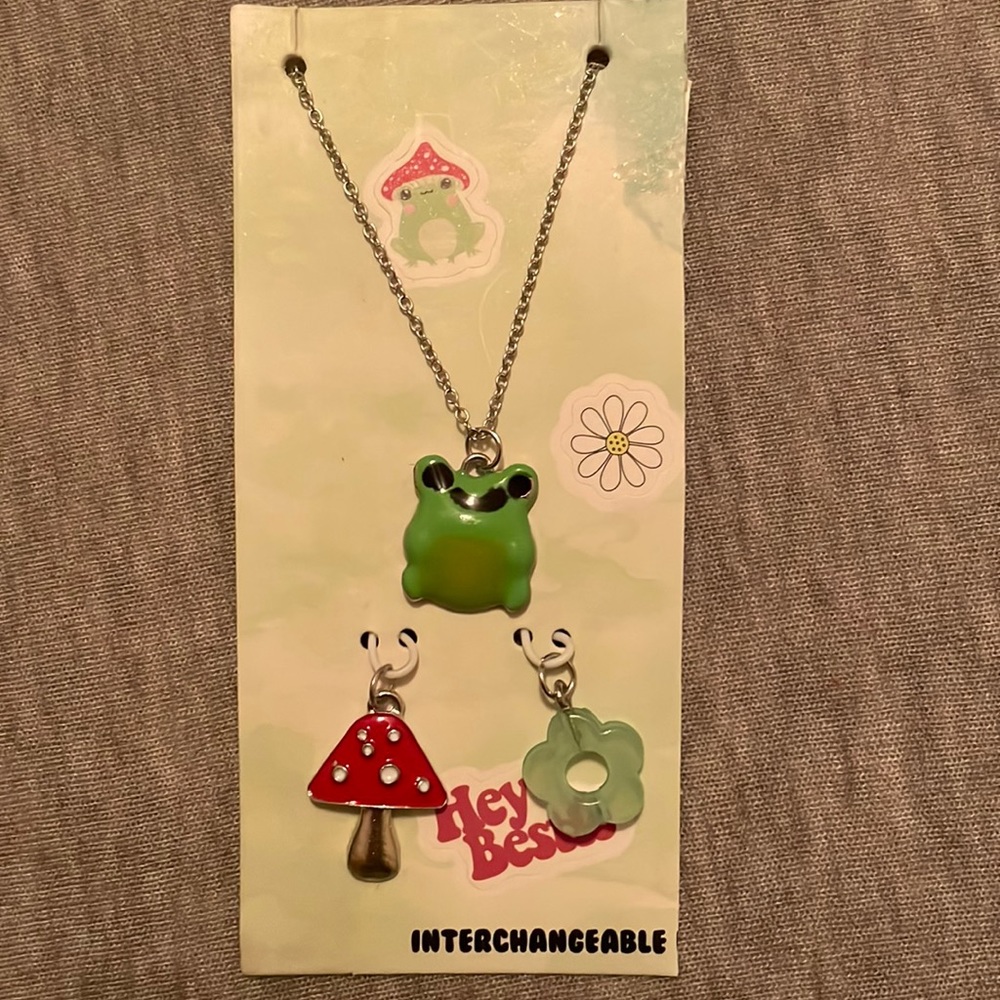 Cute green frog necklace set! There is a mushroom and a green flower!